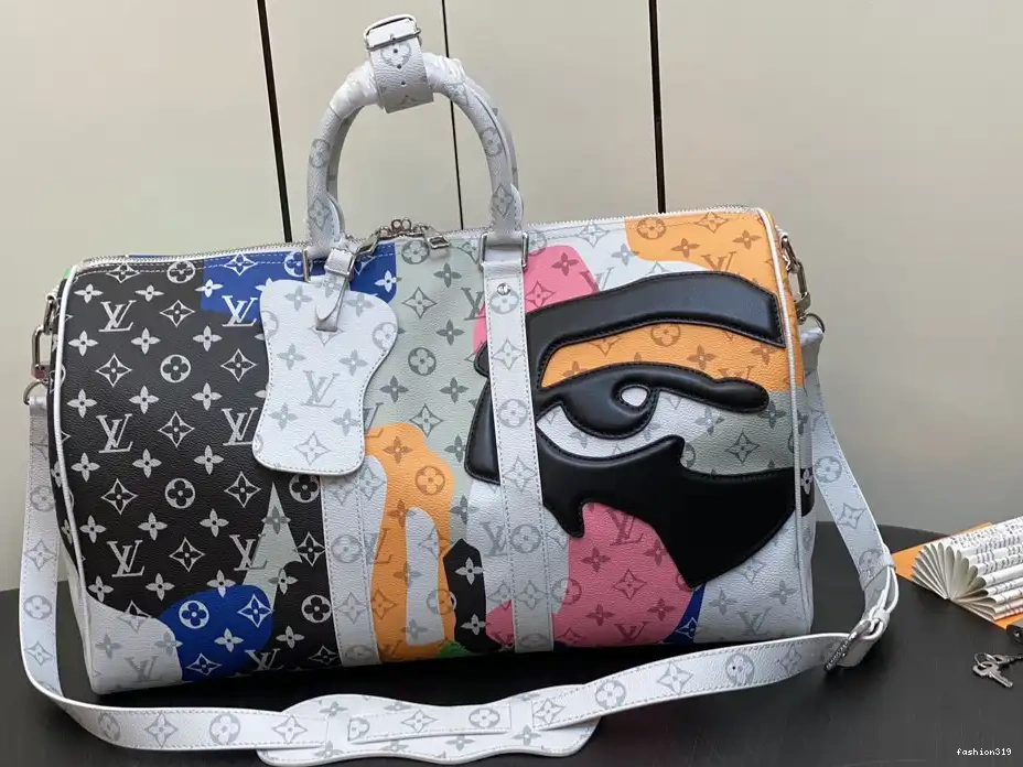 45 BANDOULIÈRE LOUIS  VUITTON KEEPALL 0326